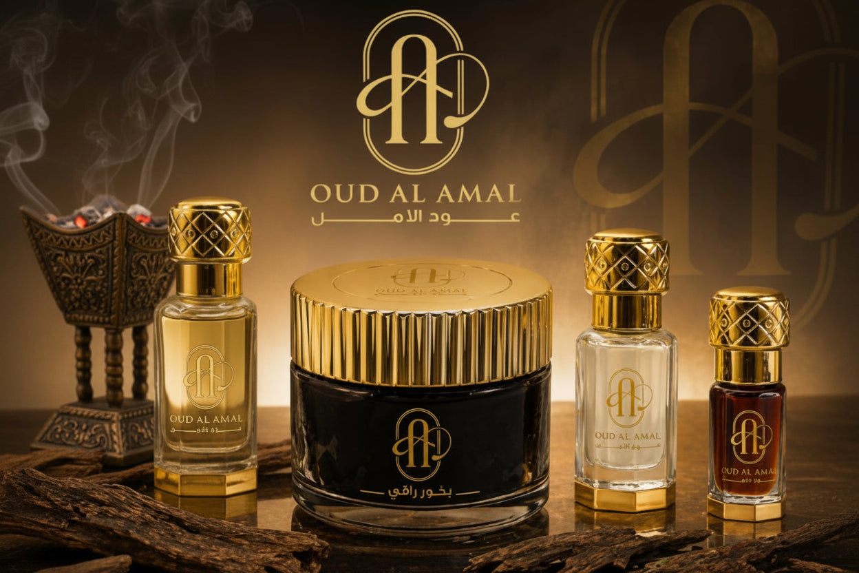 Oud Al Amal perfume bottles with gold caps on a dark background