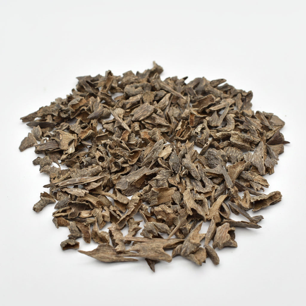 Heap of dried herbs on a white background